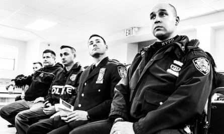 Police officers at the community meeting