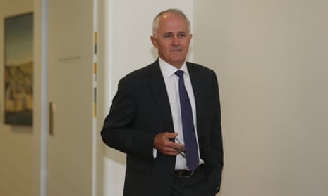 Communications minister Malcolm Turnbull walks solo into the government party room meeting this morning in Parliament House.