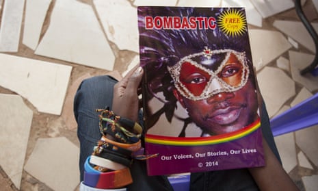 Kasha Jacqueline Nabagesera, a member of the Ugandan lesbian, gay, bisexual, transgender and intersex (LGBTI) community, holds Bombastic, a new magazine published in Kampala.