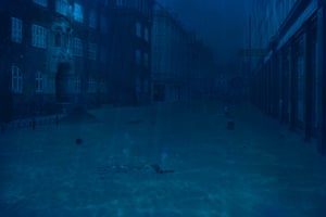 City buildings are unrecognisable in the dark water