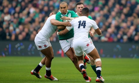 Jonathan Joseph and Anthony Watson combine to tackle Ireland's Simon Zebo.