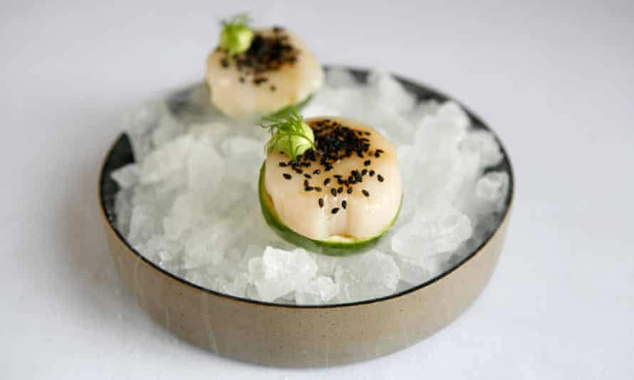 Turning Japanese: raw scallop with miso glaze and sesame seeds.