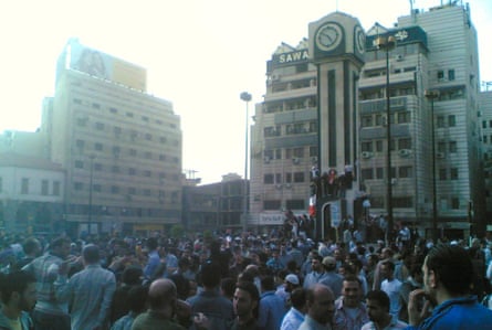 Demonstrators gather in the centre of Homs, April 2011.