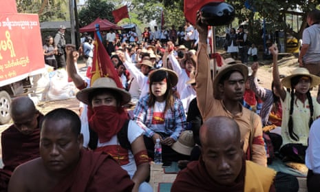Burmese students shout slogans against a new education bill in Letpadan before a violent police crackdown.