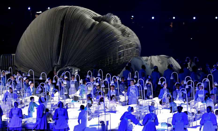 A scene from the Olympic opening ceremony celebrating the NHS