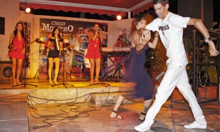 Locals salsa dance to a band in a bar in Varadero.