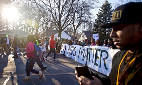 Protestors march towards the Governor's Mansion in Madison, Wisconsin.