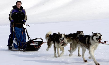 David Cameron drives a dog-sled on his way to the Scott-Turner glacier on the island of Svalbard, Norway, in 2006.