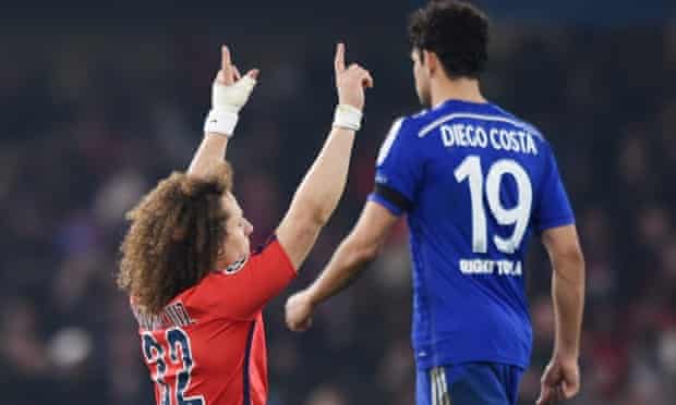 David Luiz celebrates at the end of the match as Chelsea's Diego Costa looks dejected.