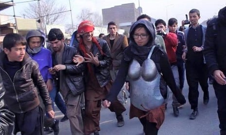 Kubra Khademi was surrounded by a mainly male crowd, which threw insults and stones during her walk.