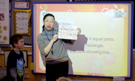Lianjie Lu, from Shanghai, teaches fractions to year 3 pupils at Fox primary school in Kensington, London.