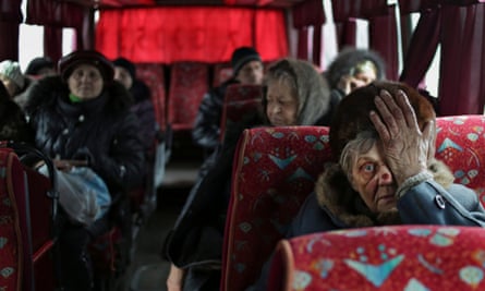 Local citizens sit in a bus as they wait to evacuation from Debaltseve of Donetsk area, 3 February.