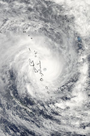 A photo captured by Nasa’s Aqua satellite on Friday 13 March 2015 at 02:20 UTC shows Cyclone Pam’s wide eye just east of Vanuatu’s islands