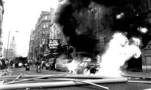Cars on fire in St Martin’s Lane, central London, on 31 March 1990. The day resulted in 339 arrests.