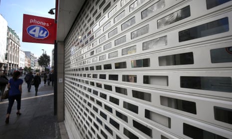 Phones 4U shop in central London with its shutters down 