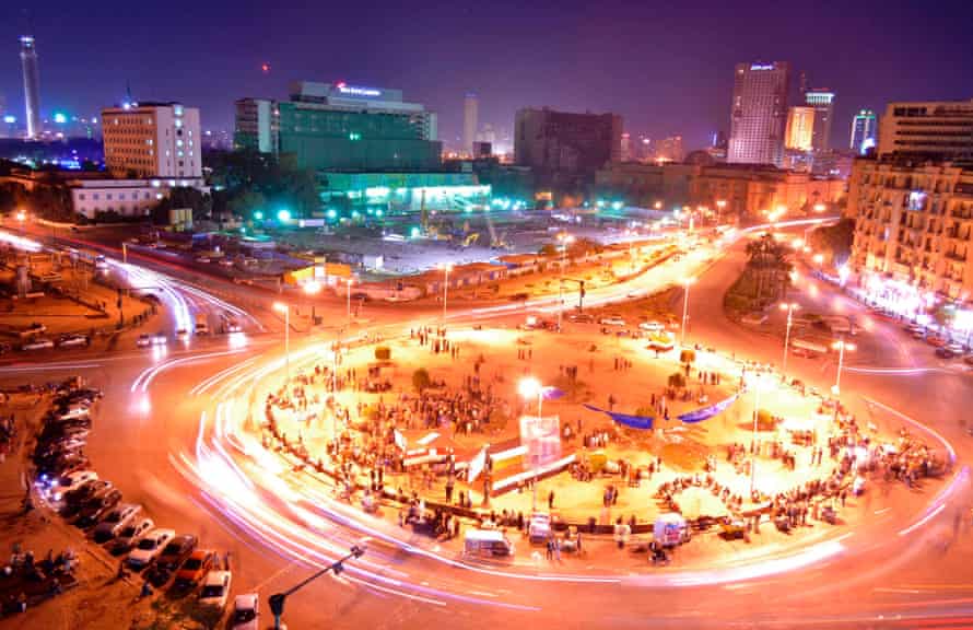 Traffic in Tahrir Square. Cairo's population is forecast to double by 2040.