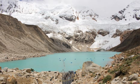 pix from GermanWatch of the Palcacocha lagoon which is above the city of Huaraz and threatens the claimant's home, Peru. That is the lake that may outburst in the case of ice avalanches. On some of those photos you can also see the drainage system in place, which however is not sufficient to secure the lagoon.