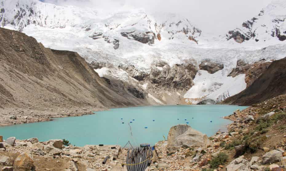 pix from GermanWatch of the Palcacocha lagoon which is above the city of Huaraz and threatens the claimant's home, Peru. That is the lake that may outburst in the case of ice avalanches. On some of those photos you can also see the drainage system in place, which however is not sufficient to secure the lagoon.