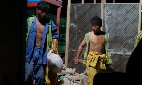 North Korean workers on a construction site in Qatar. The UN says it fears some workers from the country are working in slave-like conditions abroad including in the middle east.