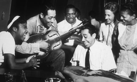 Rosetta Tharpe, left, with Duke Ellington on guitar and Cab Calloway on piano in 1939 during a jam session.
