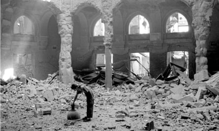Woman in the destroyed National Library hall after shelling in Sarajevo on August 26, 1992
