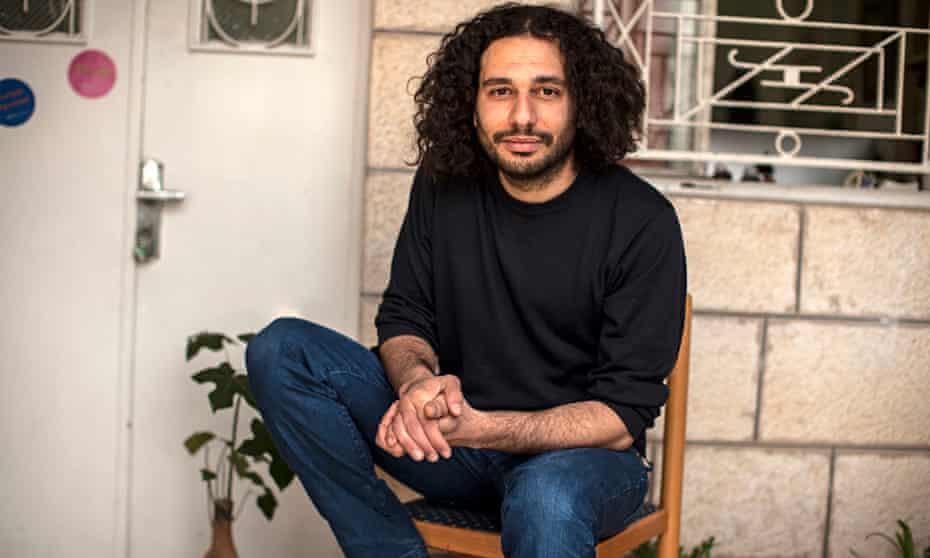 Amer Shomali photographed outside his studio in Ramallah by Tanya Habjouqa for the Observer
