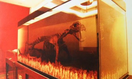 A big cat skeleton – allegedly a tiger – in an aquarium of tiger bone wine. 