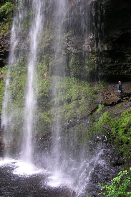It's possible for visitors to walk behind the waterfall, although it is unlikely they'll find any signs of Batman