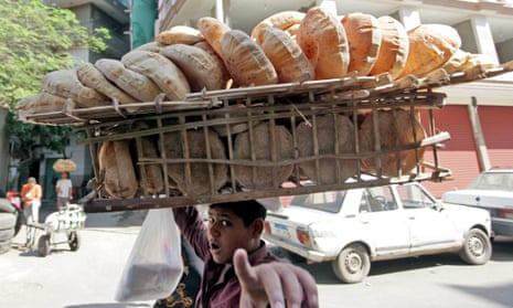 Boy selling bread in Cairo