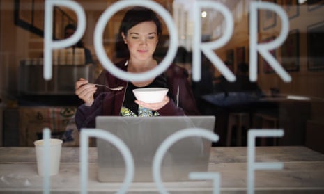 Holly Mac eats a bowl of porridge at the Porridge Cafe in Shoreditch.