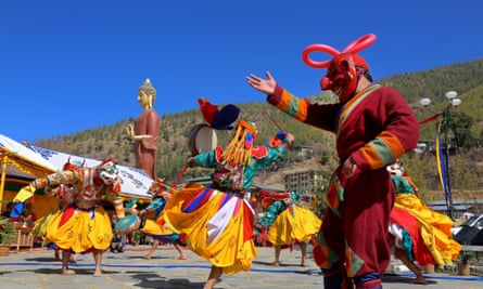Costumed monks from Majuli, India, perform a traditional dance at the Bhutan International Festival.