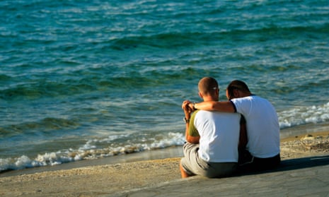 Gay couple on the beach in Mykonos