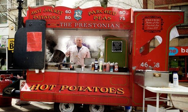 Mark Roberts selling parched peas, a local food speciality, in Preston city centre.
