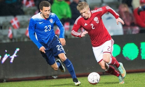 Denmark's Daniel Wass in action against Fabian Johnson