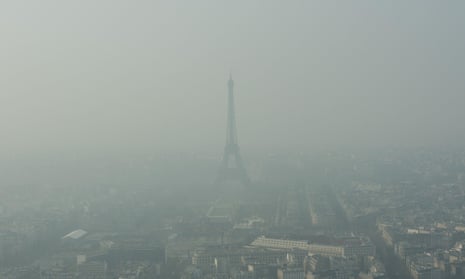 Eiffel Tower shrouded in smog.