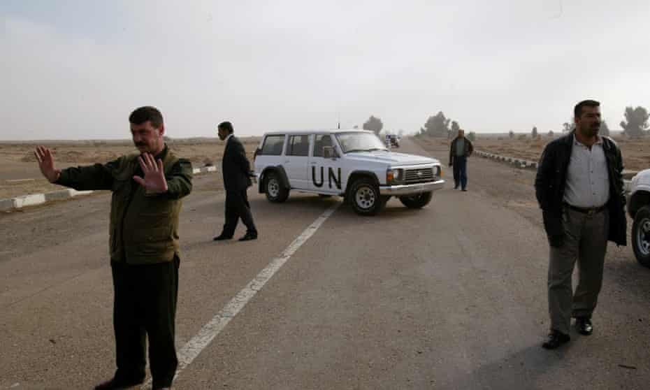 An UNMOVIC vehicle blocks the entrance of  the Al-Muthanna state establishment 40 miles north west of Baghdad after U.N. weapons inspectors entered the complex in 2002. The Al-Muthanna complex was the main production facility for chemical and biological agent production in the 1990's. Previous weapon inspection teams rendered the facility inoperative.