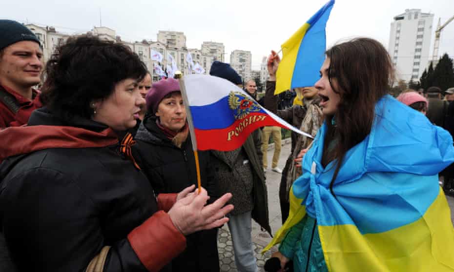 Pro-Russian and pro-Ukrainian activists argue during a rally in Sevastopol, Crimea, in 2014.