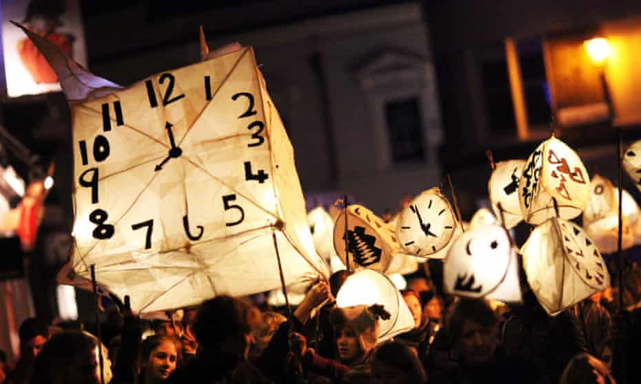 Revellers take part in the annual Burning the Clocks Winter Solstice Parade through the streets of Brighton.