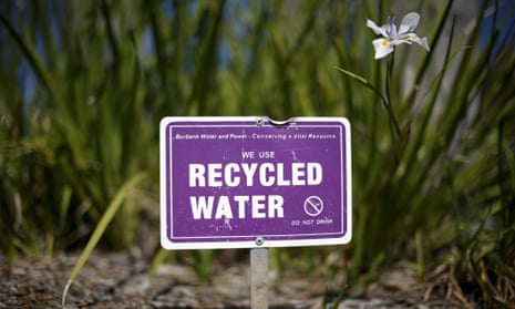 A sign indicating that recycled water is used to water plants is seen in Burbank, Los Angeles, California March 19, 2015. California Governor Jerry Brown and top lawmakers on Thursday announced a $1 billion emergency legislative package to deal with the state's devastating multi-year drought. The state is entering the fourth year of record-breaking drought that has prompted officials to sharply reduce water supplies to farmers and impose strict conservation measures statewide. REUTERS/Lucy Nicholson:rel:d:bm:GF10000031973