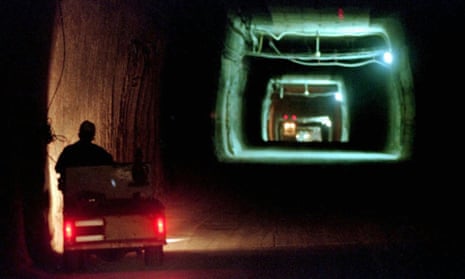 A worker drives a cart through a tunnel inside the Waste Isolation Pilot Plant No. 2, 150 feet below the surface near Carlsbad, New Mexico. Experts  have determined that an incompatible cocktail of nitrate salts and organic cat litter is to blame for a mishap that forced the closure of the nation's only underground nuclear waste repository.