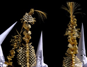 <strong>Sevilla, Spain</strong> Members of the Borriquita brotherhood hold palm leaf weaves during their celebrations