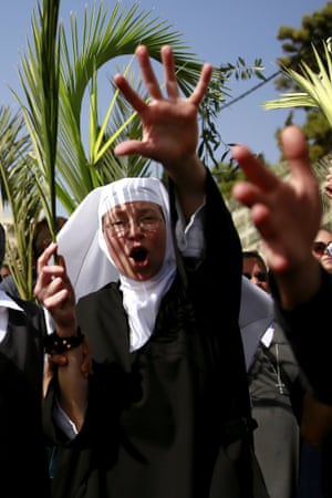 <strong>Mount Olives, East Jerusalem </strong>Catholic nuns rejoice during the traditional Palm Sunday procession from Mount Olives to Jerusalem’s Old City