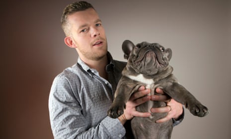 Russell Tovey poses with his french bulldog, named Rocky
