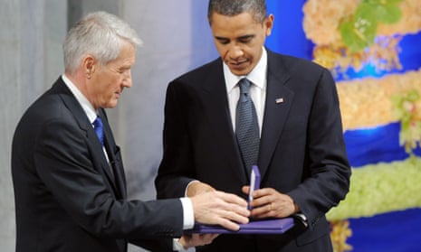 Thorbjørn Jagland handing the Nobel peace prize diploma and medal to Barack Obama – a decision that angered many Norwegians.