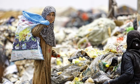 Iraq and Afghanistan accounted for 22% of all official development assistance (ODA) sent to fragile states and economies … an Iraqi girl searches through rubbish for recyclable items, Najaf, central Iraq.
