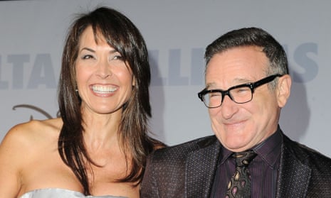 FILE - This Nov. 9, 2009 file photo shows actor Robin Williams, right, and  his wife Susan Schneider at the premiere of "Old Dogs" in Los Angeles. Attorneys for Robin Williams  wife and children are headed to court in their battle over the late comedian s estate. The attorneys are scheduled to appear before a San Francisco probate judge on Monday, as they argue over who should get clothes and other personal items the actor kept at one his Northern California homes. In papers filed in December, Williams' wife, Susan, says some of the late actor's personal items were taken without her permission. She has asked the court to set aside the contents of the home she shared with Williams from the jewelry, memorabilia and other items Williams said the children should have. (AP Photo/Katy Winn, FIle)
