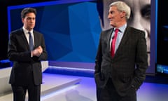 Spot the red tie: Ed Miliband and Jeremy Paxman chat during the filming of Cameron and Miliband: The