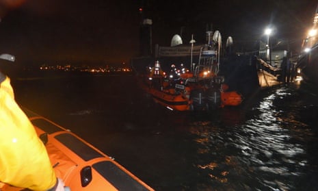 RNLI lifeboats on the scene at the Esso refinery marine terminal at Fawley, after a man jumped into the water to help rescue a crew member from a tugboat.