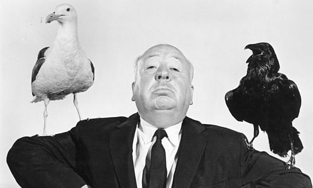 Alfred Hitchcock poses for the release of The Birds in 1963.