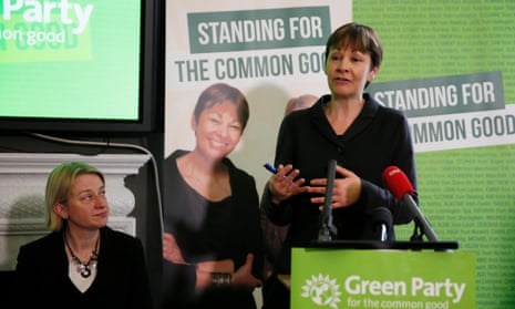 Green party MP Caroline Lucas speaks, watched by leader Natalie Bennet, at the party’s general election campaign launch